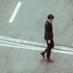 Person walking representing weight loss plateau journey